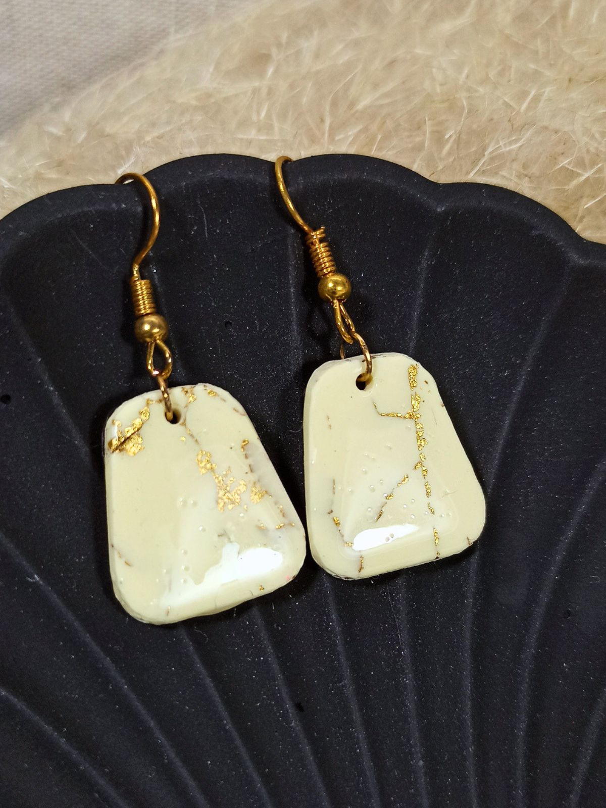 Medium size vanilla and gold dangle earrings