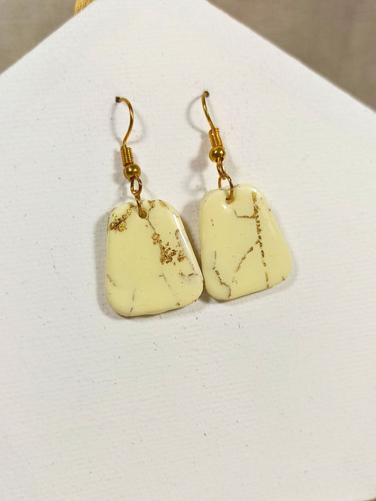Medium size vanilla and gold dangle earrings