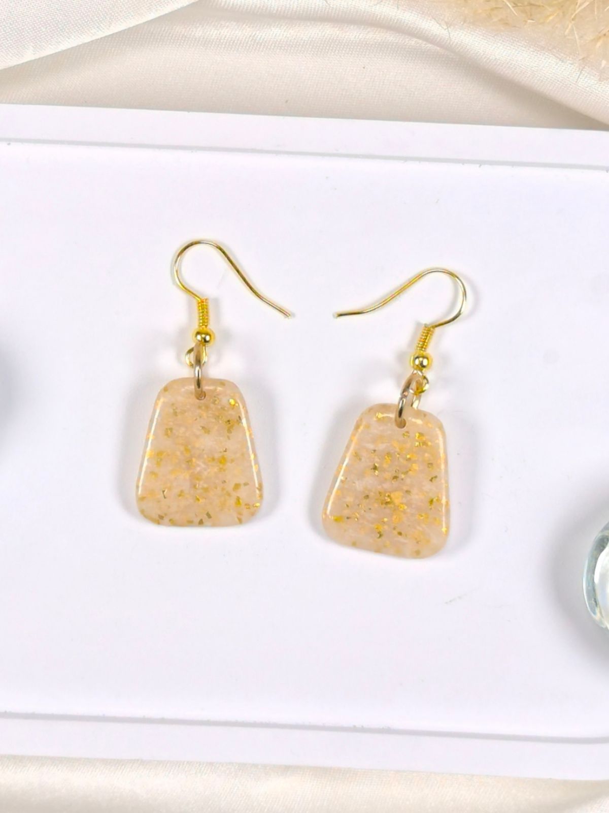 Medium size soft golden shimmer polymer clay earrings