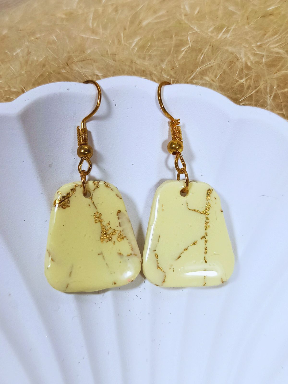 Medium size vanilla and gold dangle earrings