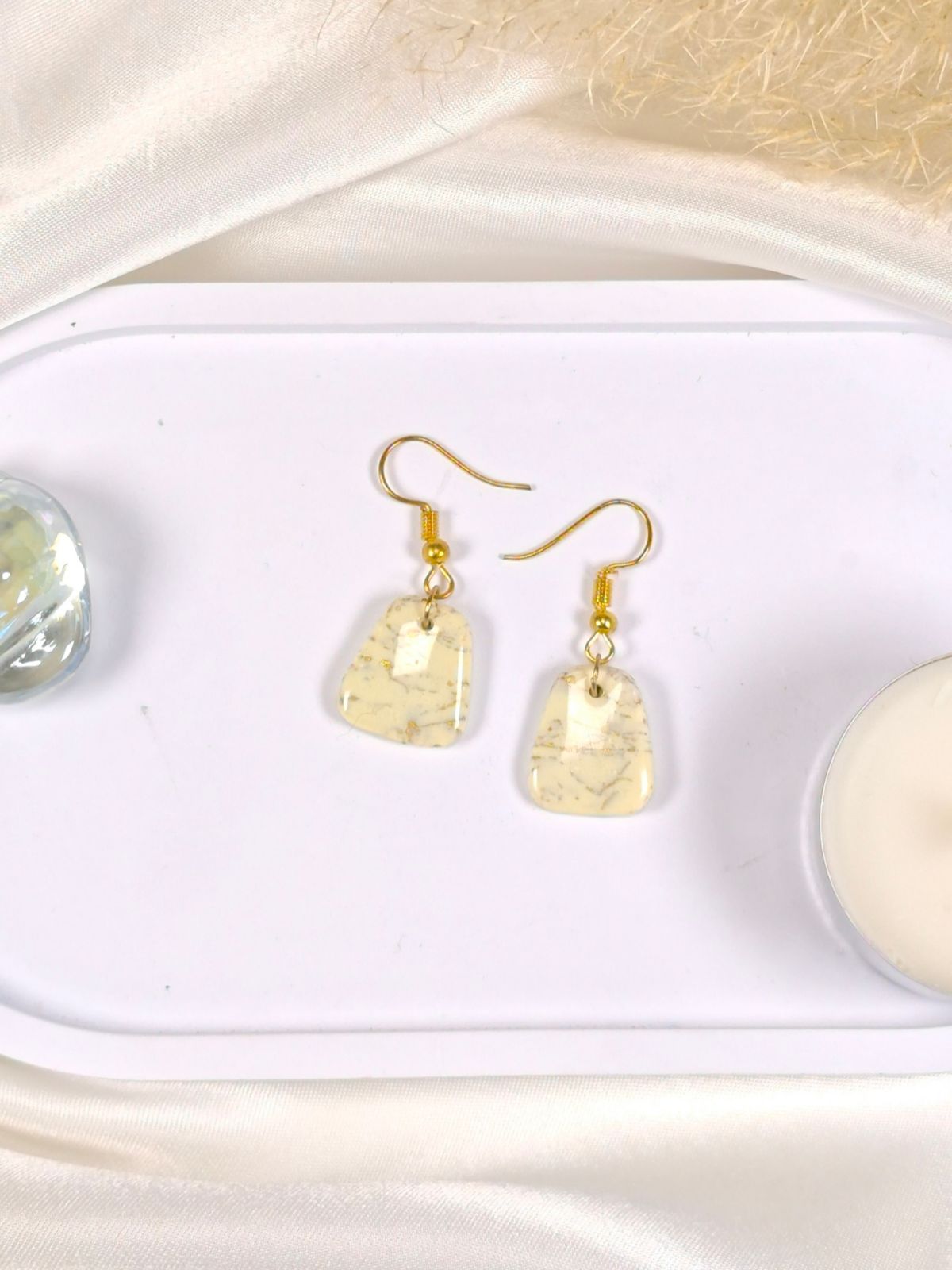 Small vanilla and gold dangle earrings
