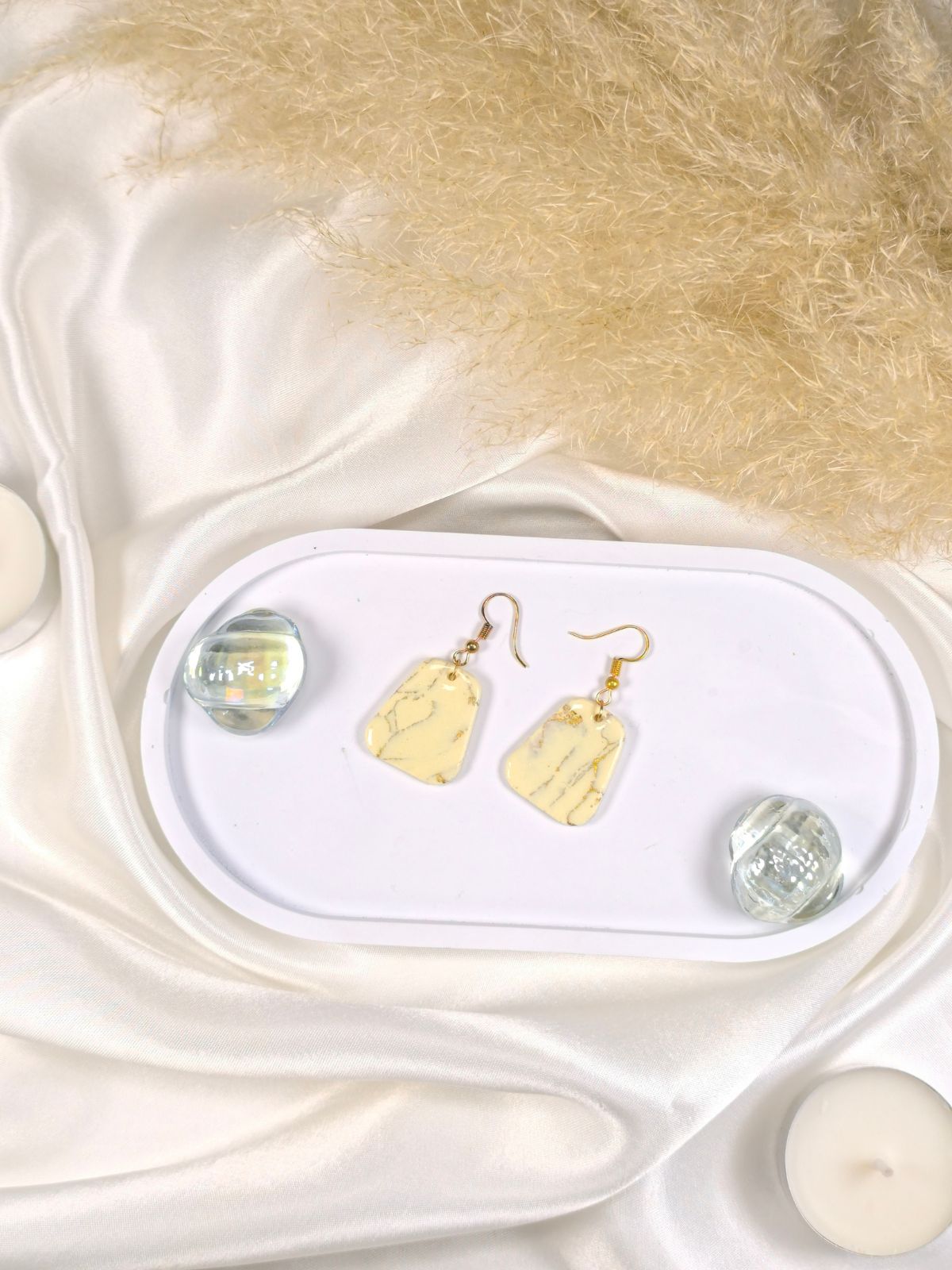 Large vanilla and gold dangle earrings