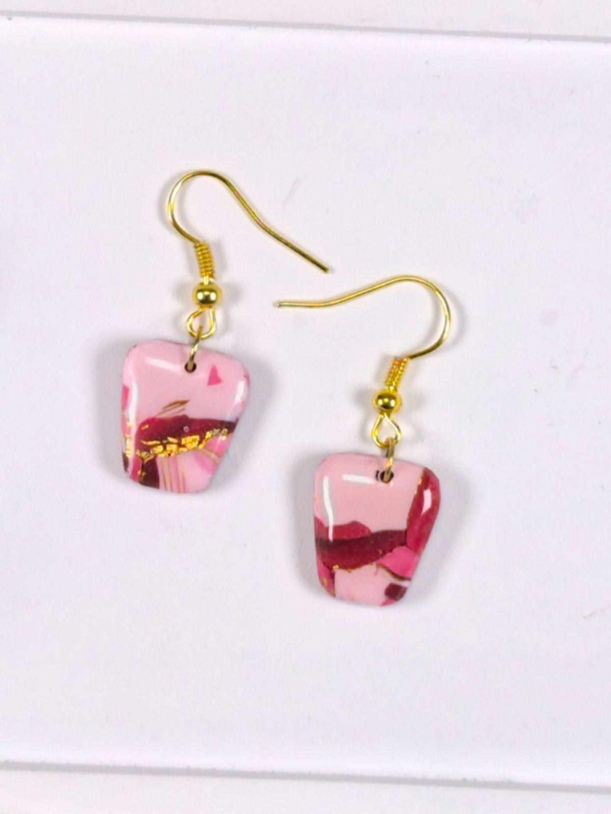 Short red pink and gold polymer clay earrings