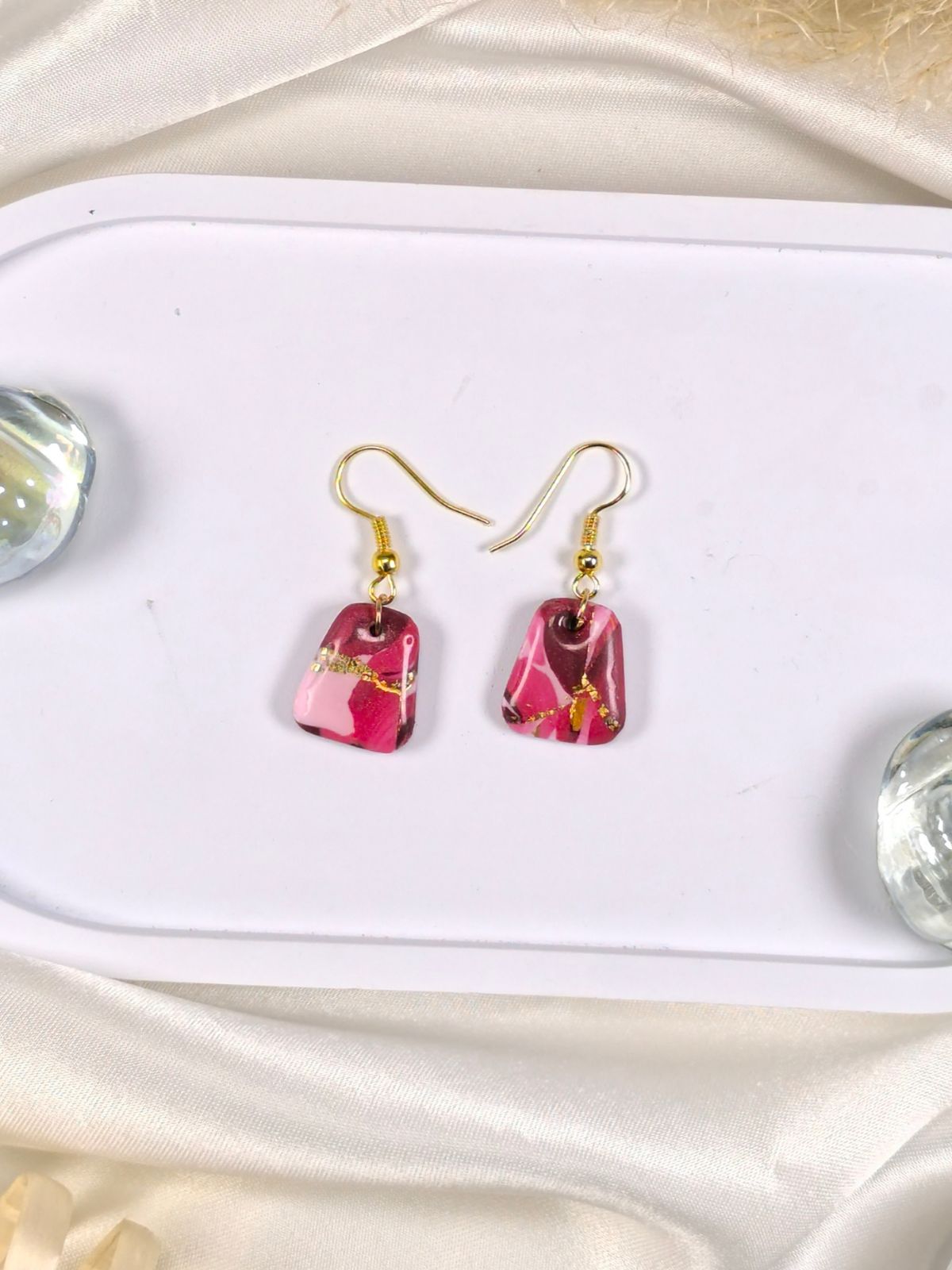 Short red pink and gold polymer clay earrings